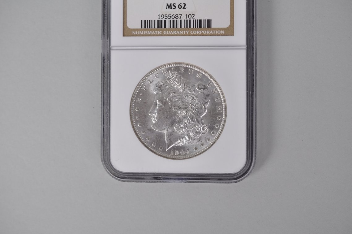 Graded and Slabbed Mint Condition Morgan Silver Dollar, photo 2 of 5