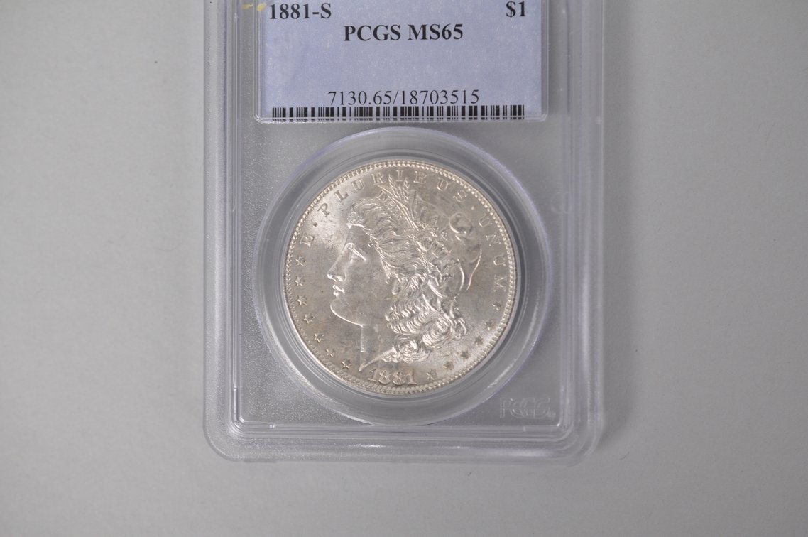 Graded and Slabbed Mint Condition Morgan Silver Dollar, photo 3 of 6