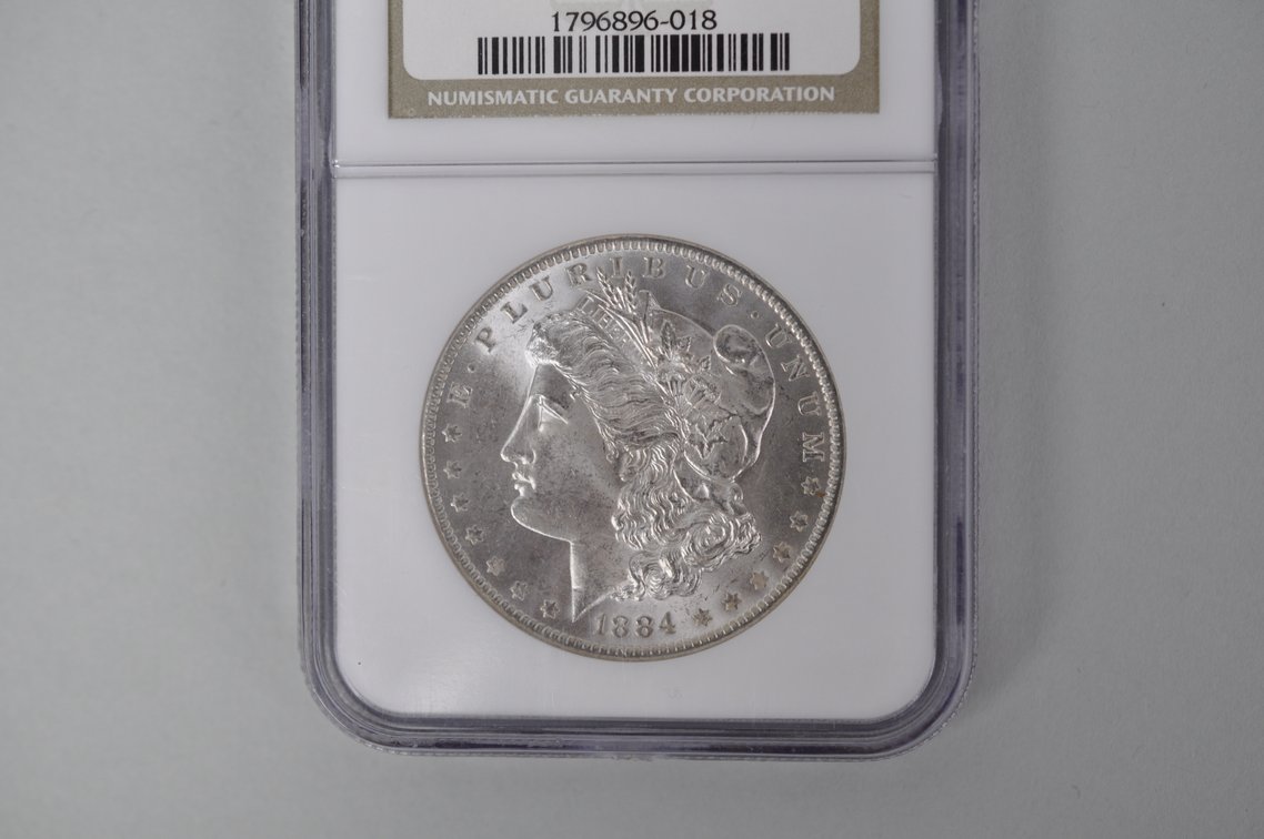 Graded and Slabbed Mint Condition Morgan Silver Dollar, photo 3 of 6