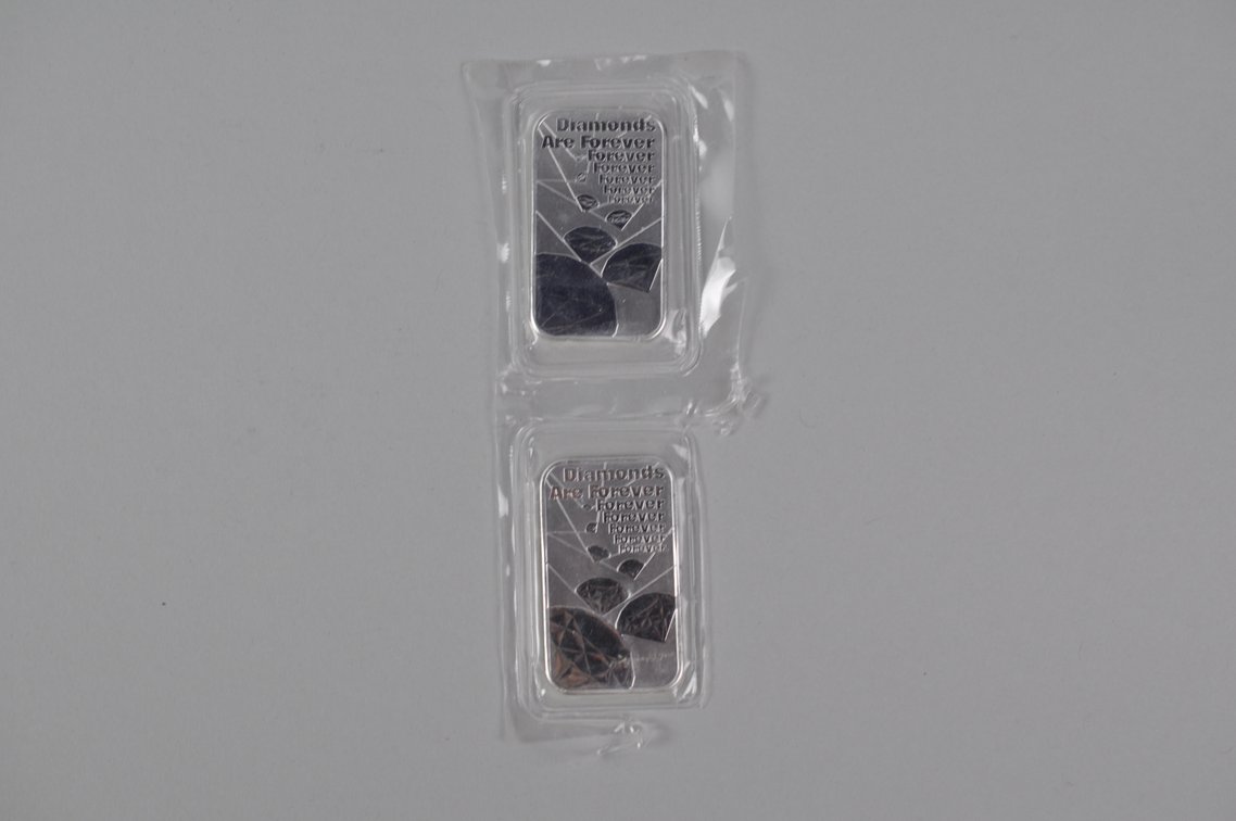 Two The Royal Mint 007 1 ozt .9999 Fine Silver Bars, photo 7 of 12