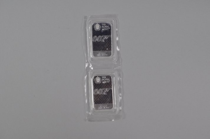 Two The Royal Mint 007 1 ozt .9999 Fine Silver Bars