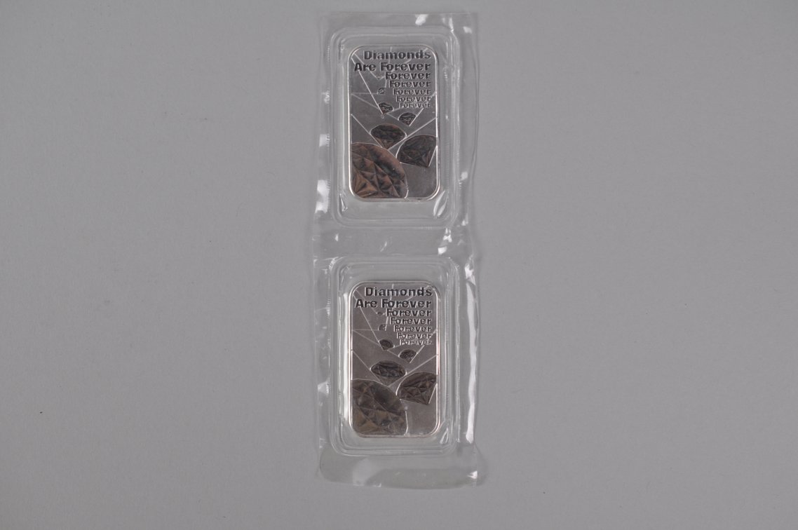 Two The Royal Mint 007 1 ozt .9999 Fine Silver Bars, photo 8 of 12