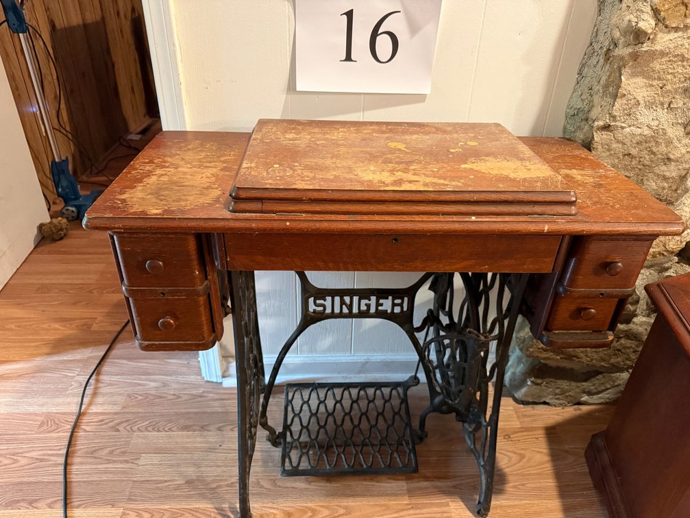 Singer tredle sewing machine cabinet