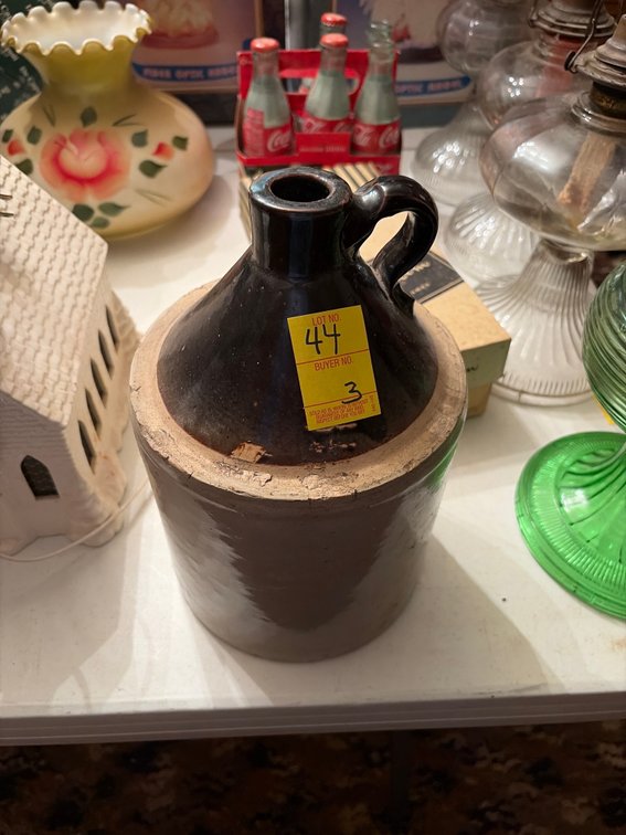 Stoneware wiskey jug, florsheim shoe box & 5 coke bottles