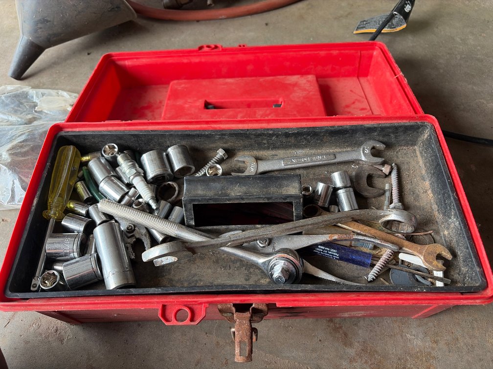 Box of wrenches; sockets; ratchets; etc.