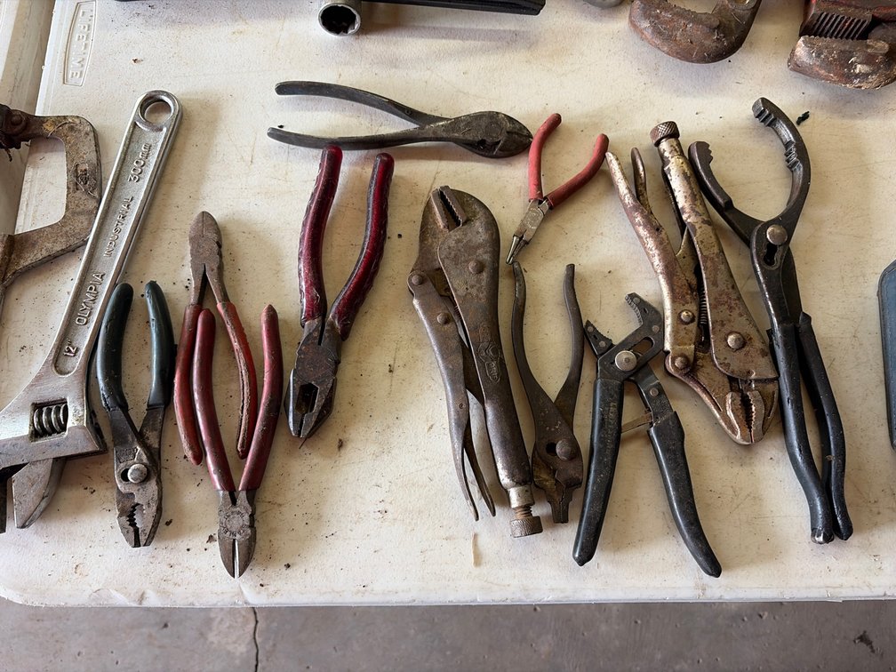 22 various Chanel locks; vice grips; crescent wrench; pliers; etc.