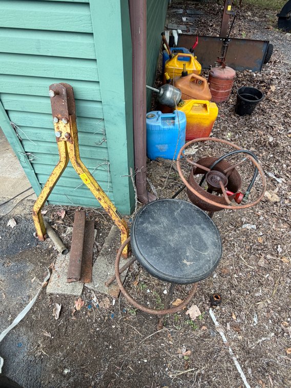A frame tow bar, chair, cooker, steel beam.