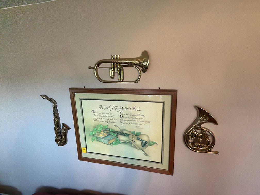 Plastic instruments; “the touch of the masters hand” picture frame