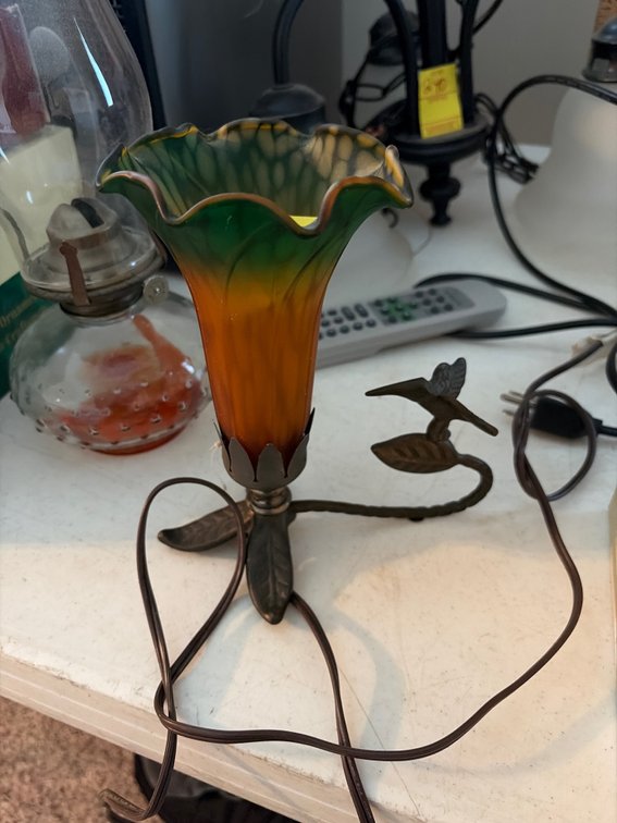 Tiffany style trumpet flower and humming bird lamp