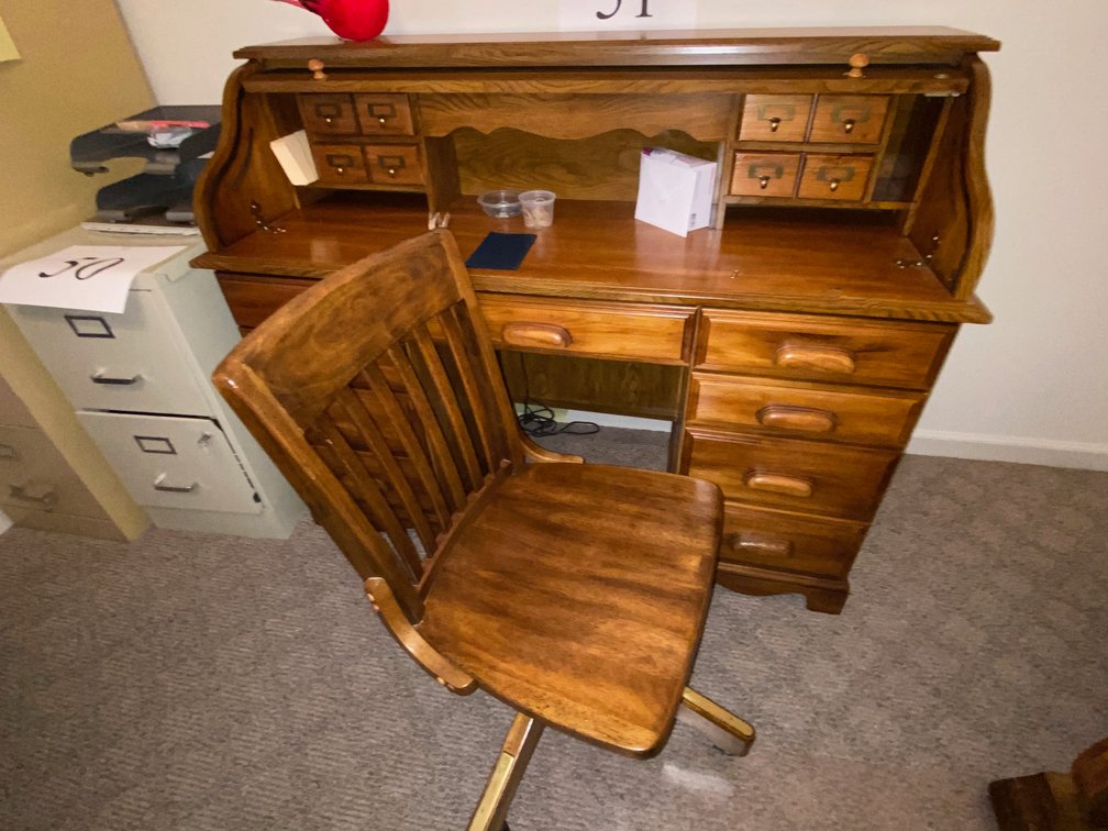 15 DRAWER OAK SCROLL TOP DESK, OFFICE CHAIR, & 2 CARPET PROTECTORS