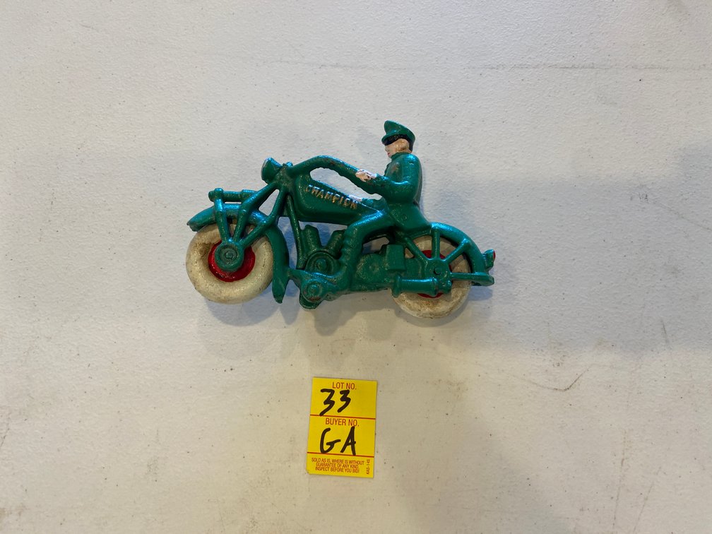 VINTAGE CAST IRON CHAMPION MOTORCYCLE FIGURE