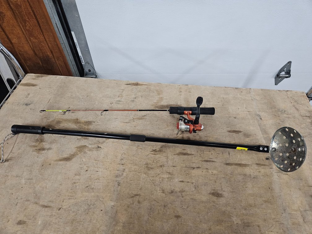 Celsius Ice Fishing Pole & Reel And A Telescopic Ice Skimmer