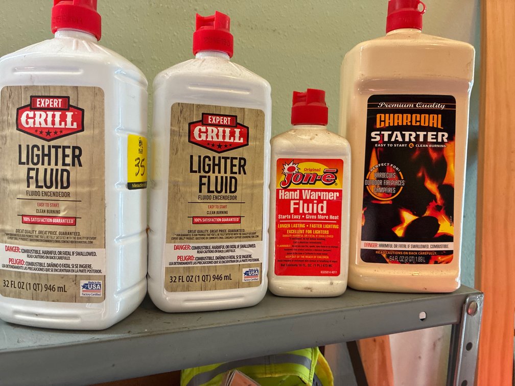 4 Jugs of charcoal/lighter fluid