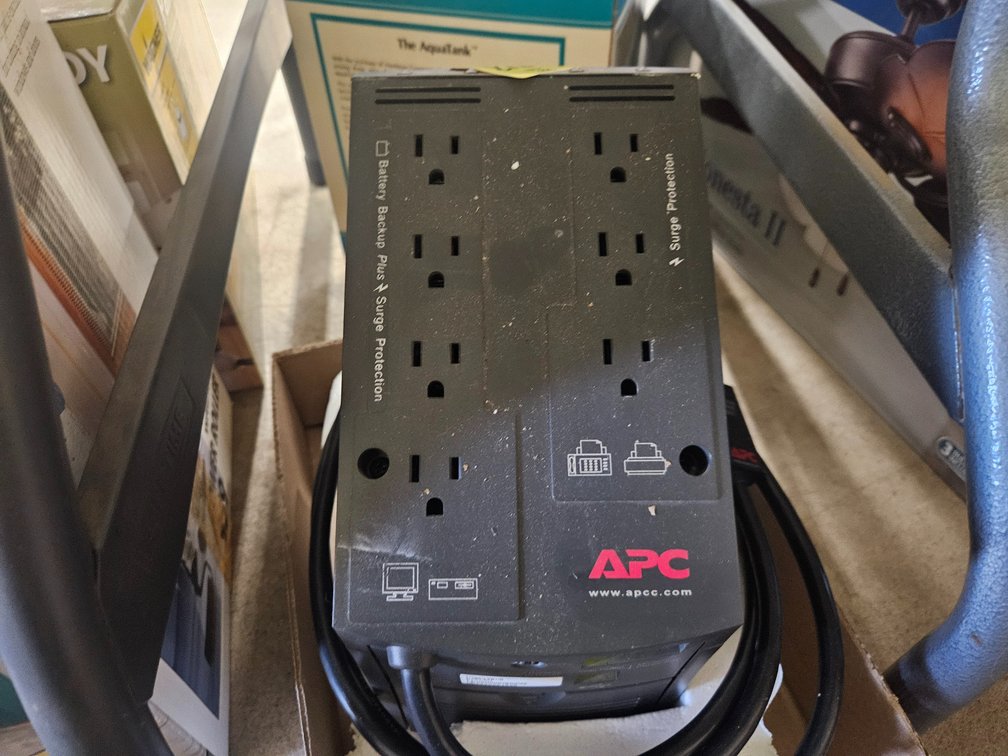 Battery back up and surge protector