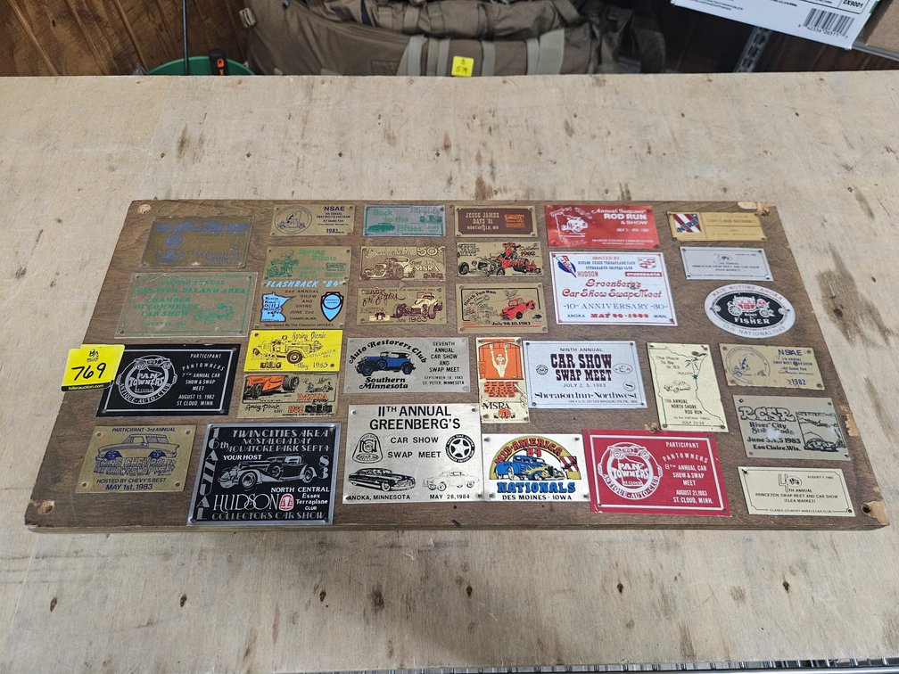 Assorted car show plaques