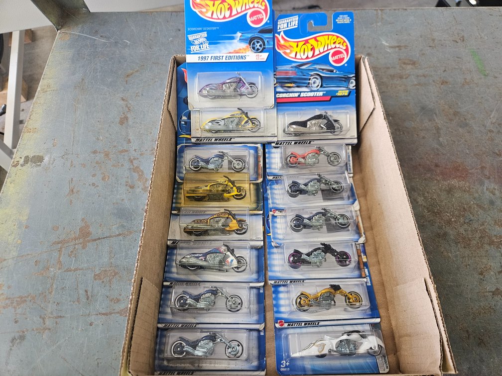 Assorted Hot Wheels and motorcycles