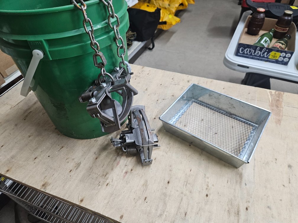 Bucket Of Leg Traps & Misc