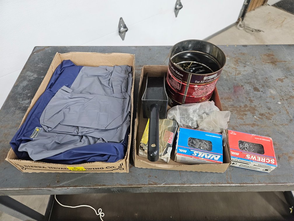 Assorted nails, screws, rain jacket, tarp