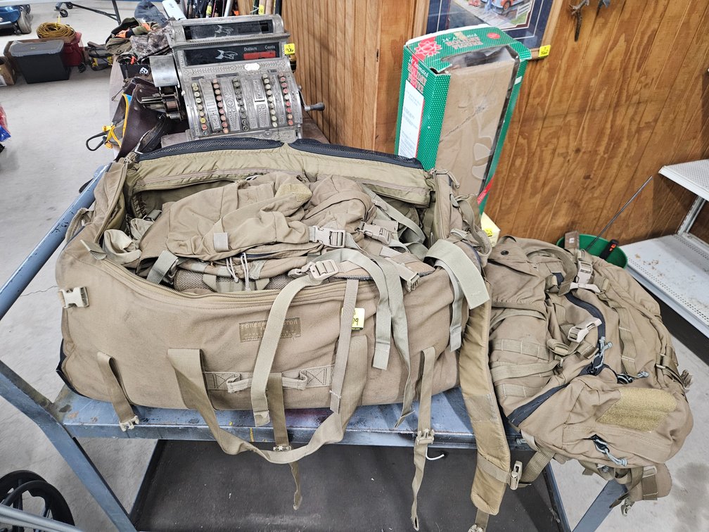 3 Backpacks, 1 Large rolling duffle bag