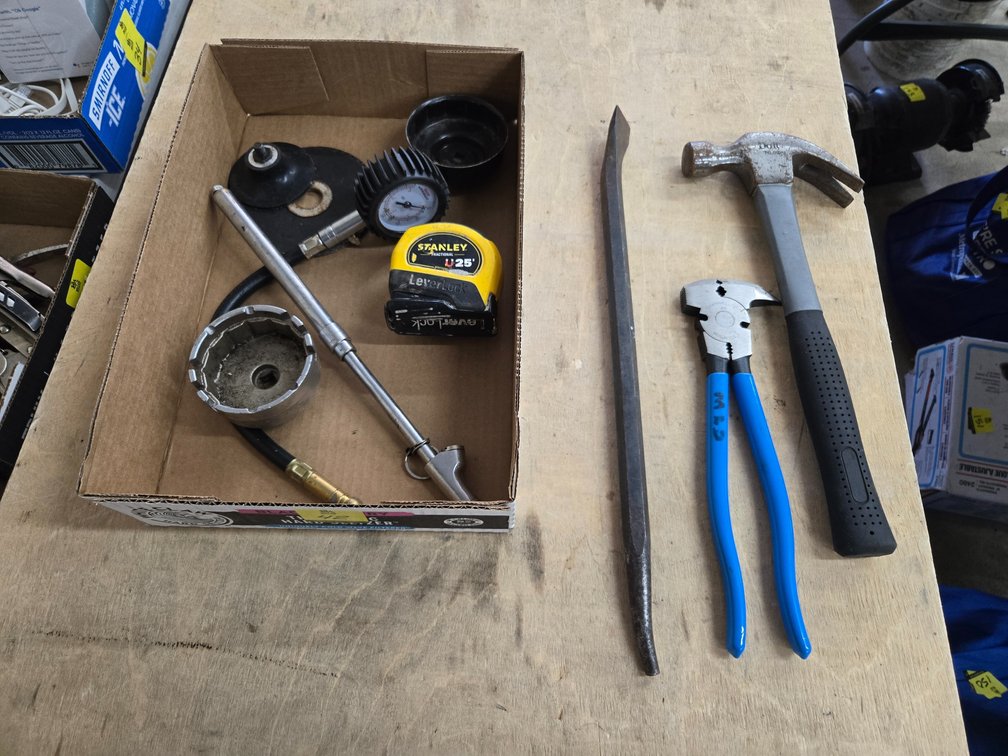 Misc. oil filter wrenches, tire gauges, and various hand tools