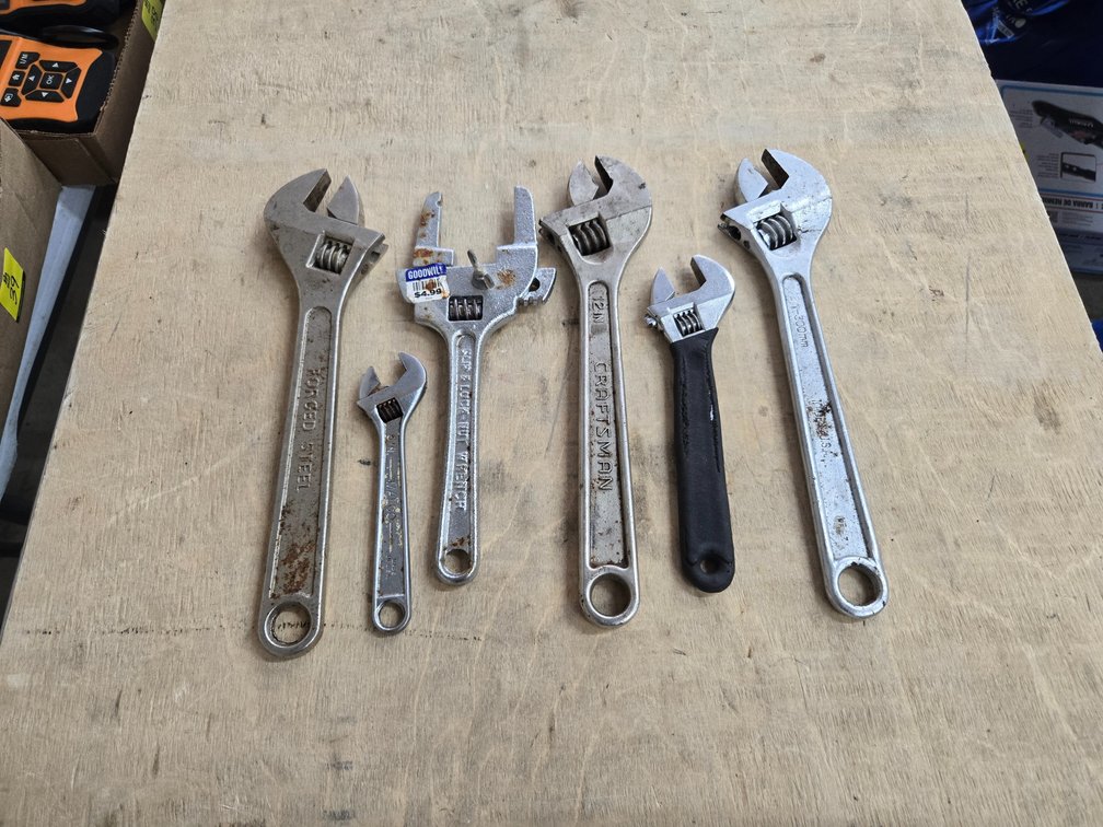 Adjustable wrenches