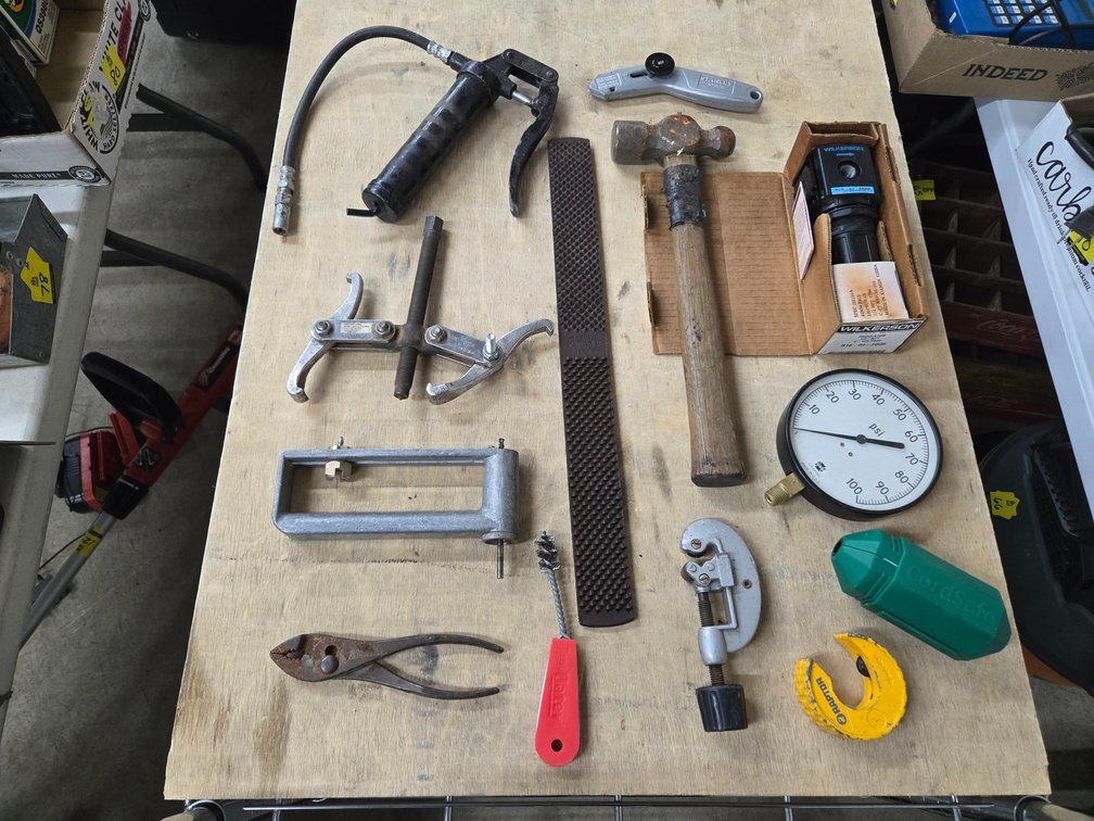 Air regulator, pulley puller, mini grease gun, and misc.