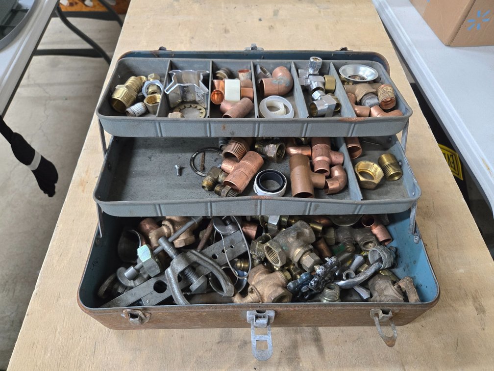 Metal toolbox with brass and copper fittings