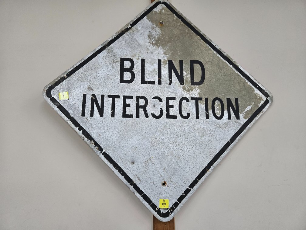 Blind intersection sign