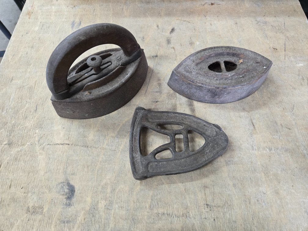 2 Vintage irons and 1 trivet