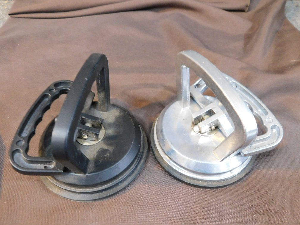 Two Glass Suction Cups