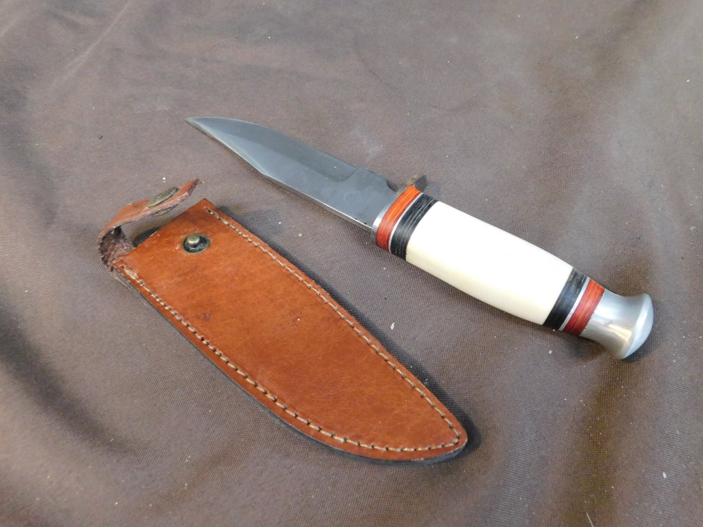 White Handled Bowie Style Knife With Leather Sheath
