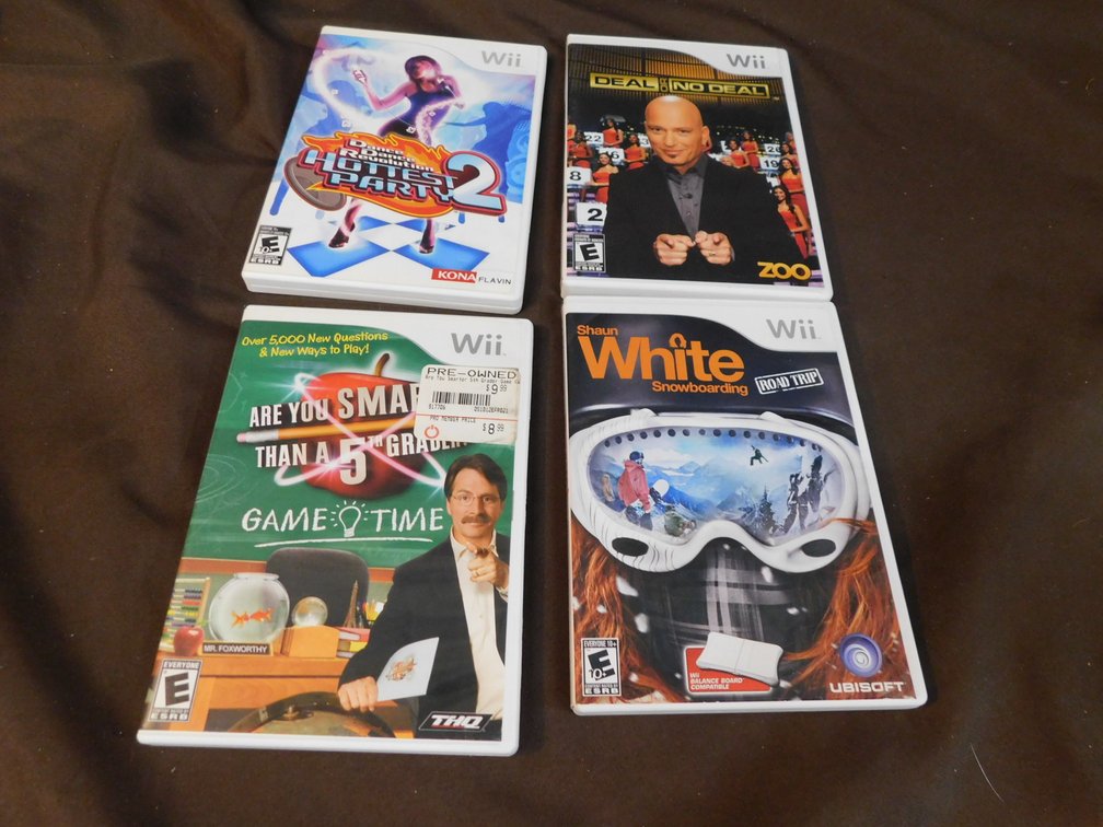 Four Wii Games, Dance Dance Revolution, Game Time, Shaun White Snowboarding, Deal or NO Deal