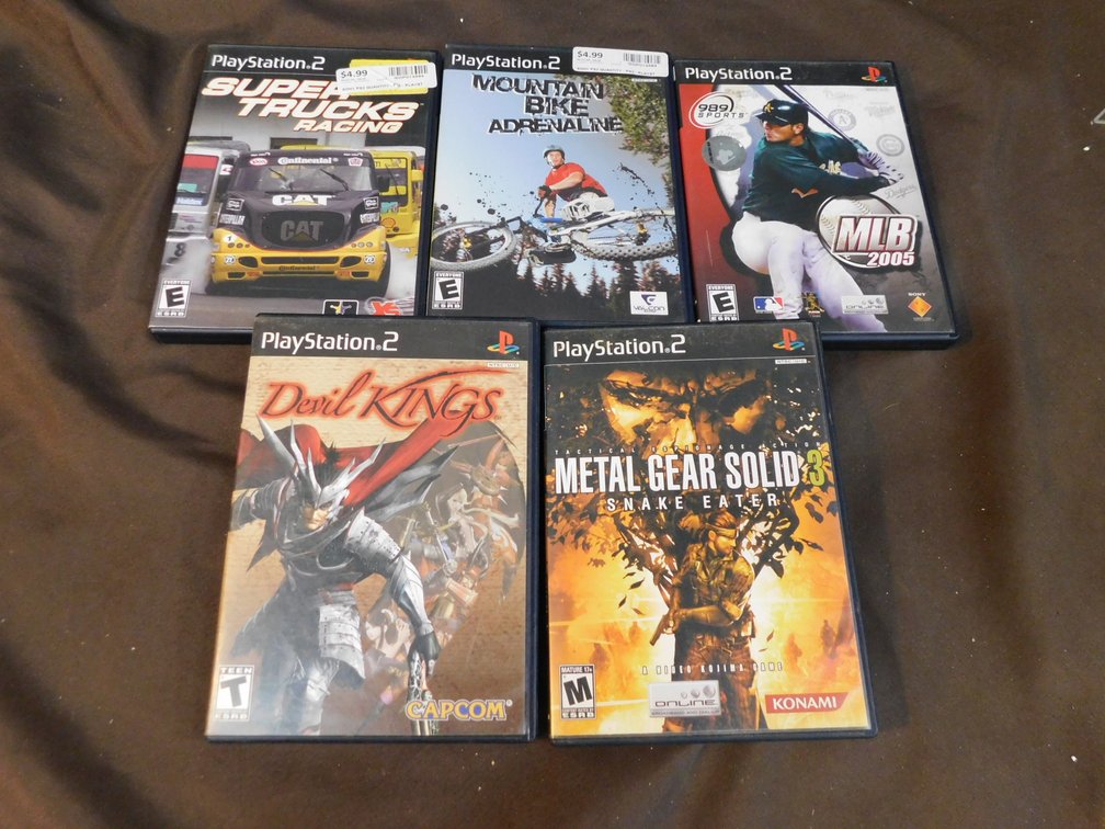 Five PlayStation 2 Games, Mountain Bike, MLB 2005, Metal Gear Solid 3, Super Trucks Racing, Devil Kings