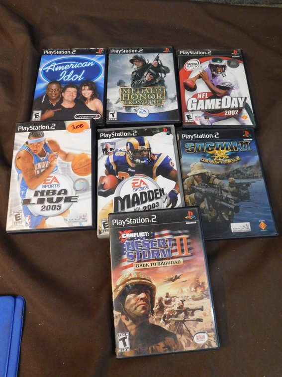 Seven PlayStation 2 Games, Madden 2003, American Idol, NFL Gameday 2002, Medal of Honor Frontline, NBA Live 2005, Desert Storm II, Socom II: US Navy Seal
