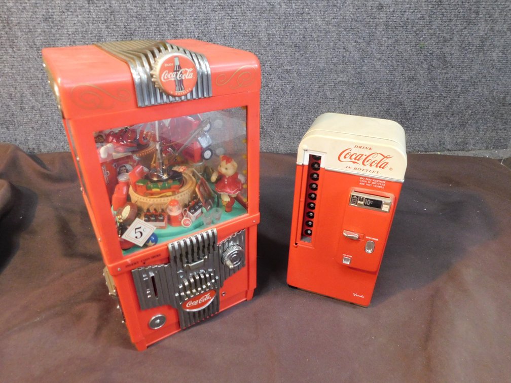 Two Coca-Cola Coin Banks