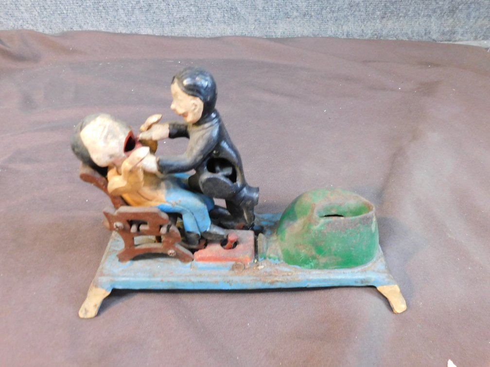 Vintage Cast Iron Mechanical Dentist Bank