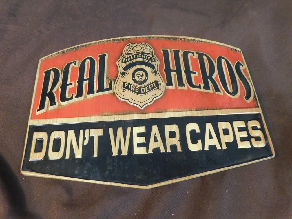 Real Heros Don't Wear Capes Metal Sign 9" x 12"