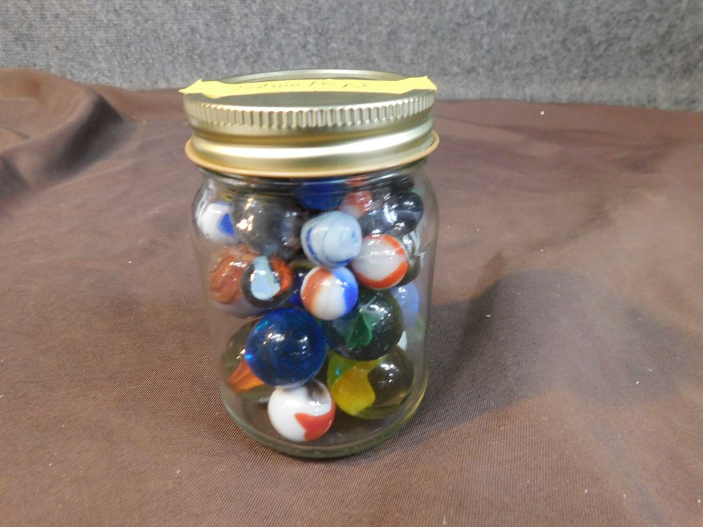 Pint Jar of Marbles, 2 Uranium Marbles