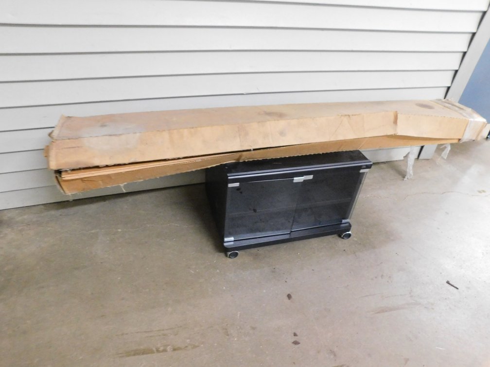 Box of Flooring on Rolling Cart