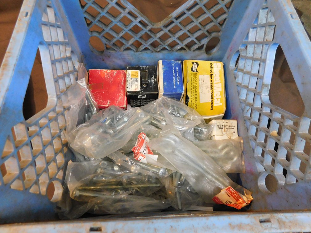 Milk crate of assorted hardware