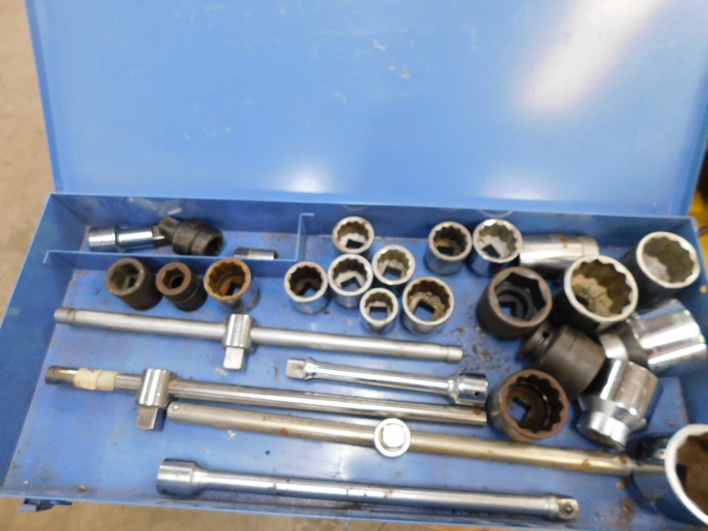 Assorted 3 qtr. in drive sockets, extensions, and breaker bars in metal box mostly USA made