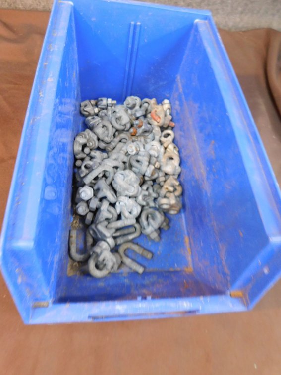 Plastic container of assorted cable size cable clamps