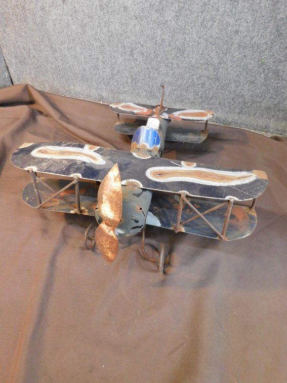 Folk art decorative metal bi-plane