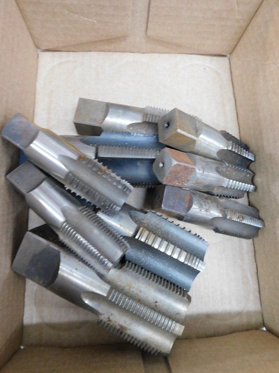 Assorted large taps in flat
