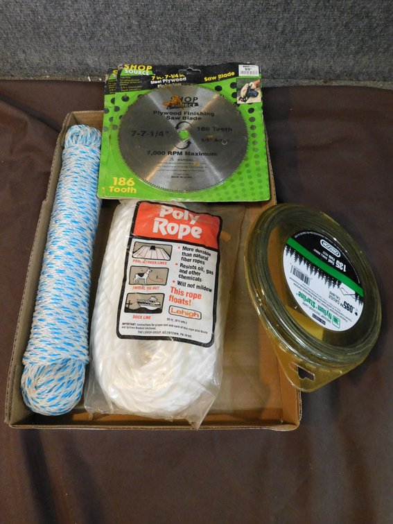 Lot of assorted rope, trimmer line, saw blade, etc., in flat