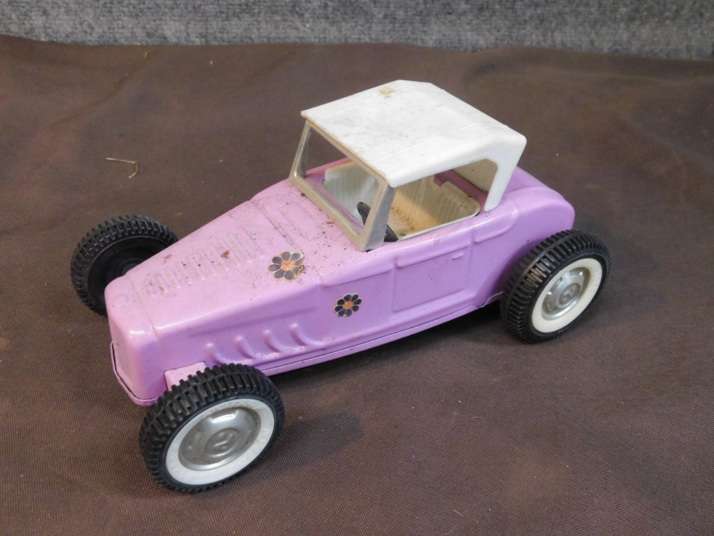 Vintage Nylint Pressed Steel Pink Roadster Toy Car