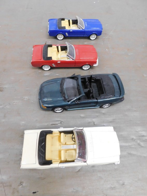 Four Collectible Convertible Toy Cars