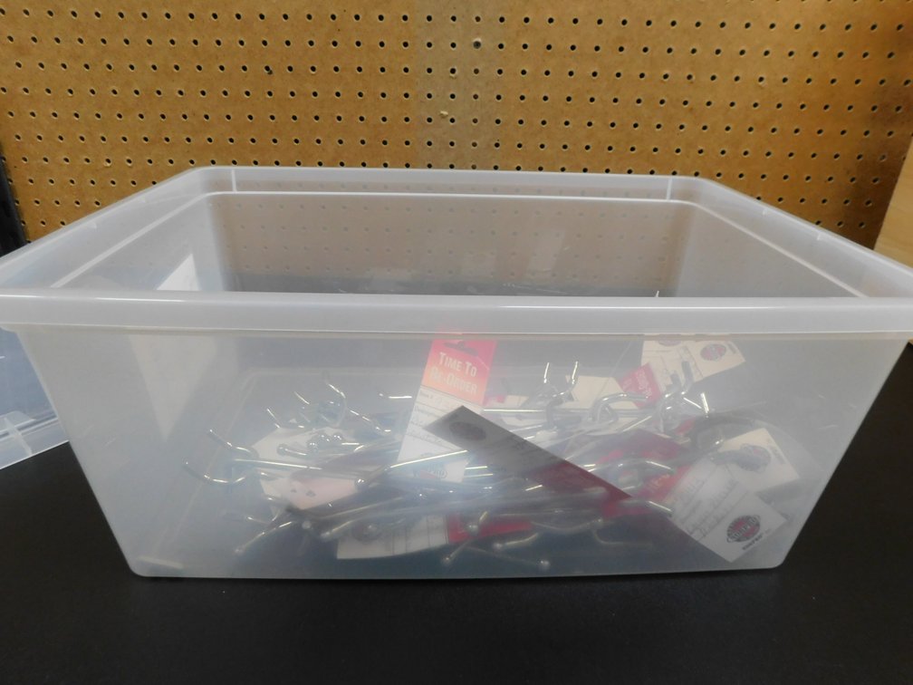 Small Plastic Tote with Assorted Pegs