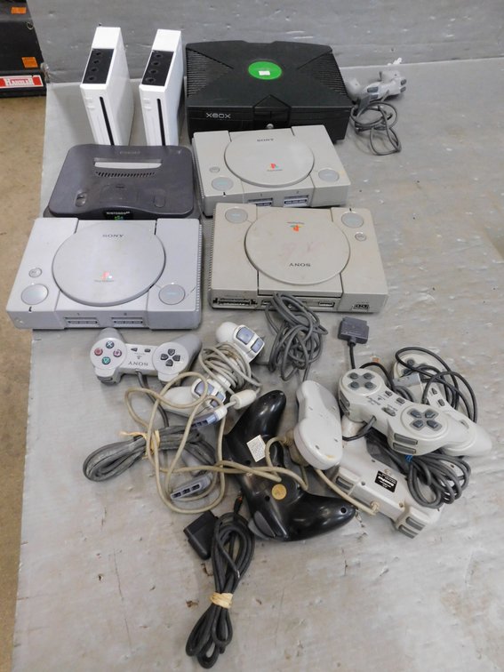 10 Gallon Tote with Assorted Game Consoles, Unknown condition