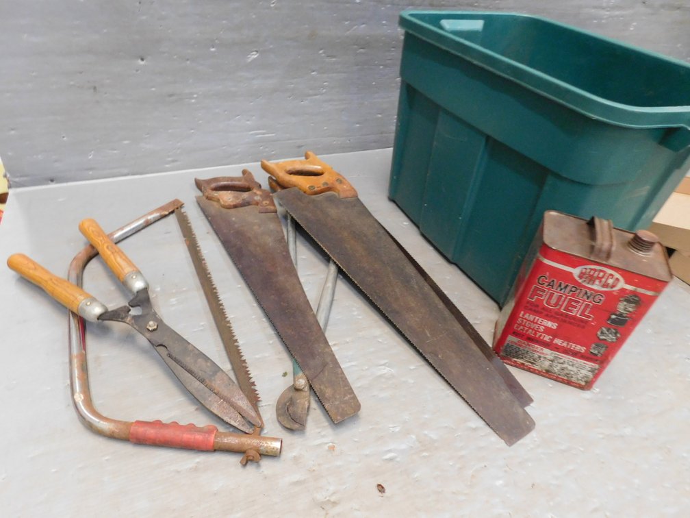 Tote With Antique Fuel Can, Hand Saws, Clippers etc.